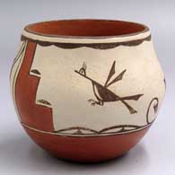Polychrome jar decorated with a roadrunner, rain cloud and geometric design