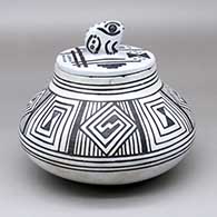 A lidded black-on-pearl-gray water jar decorated with bands of feather and geometric design