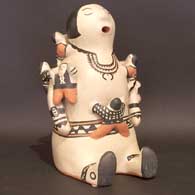 A classic Cochiti storyteller figure