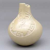 A buff vase with a kiva-step cut rim and a sgraffito medallion with a kokopelli and geometric design