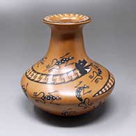 A polychrome water jar with a rolled lip and decorated with a serpent, lizard and geometric design