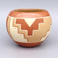 A polychrome bowl decorated with a sgraffito and painted kiva step and geometric design