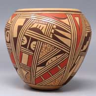 A small polychrome jar decorated with a 4-panel geometric design