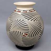 A polychrome jar decorated with a spiraling geometric design