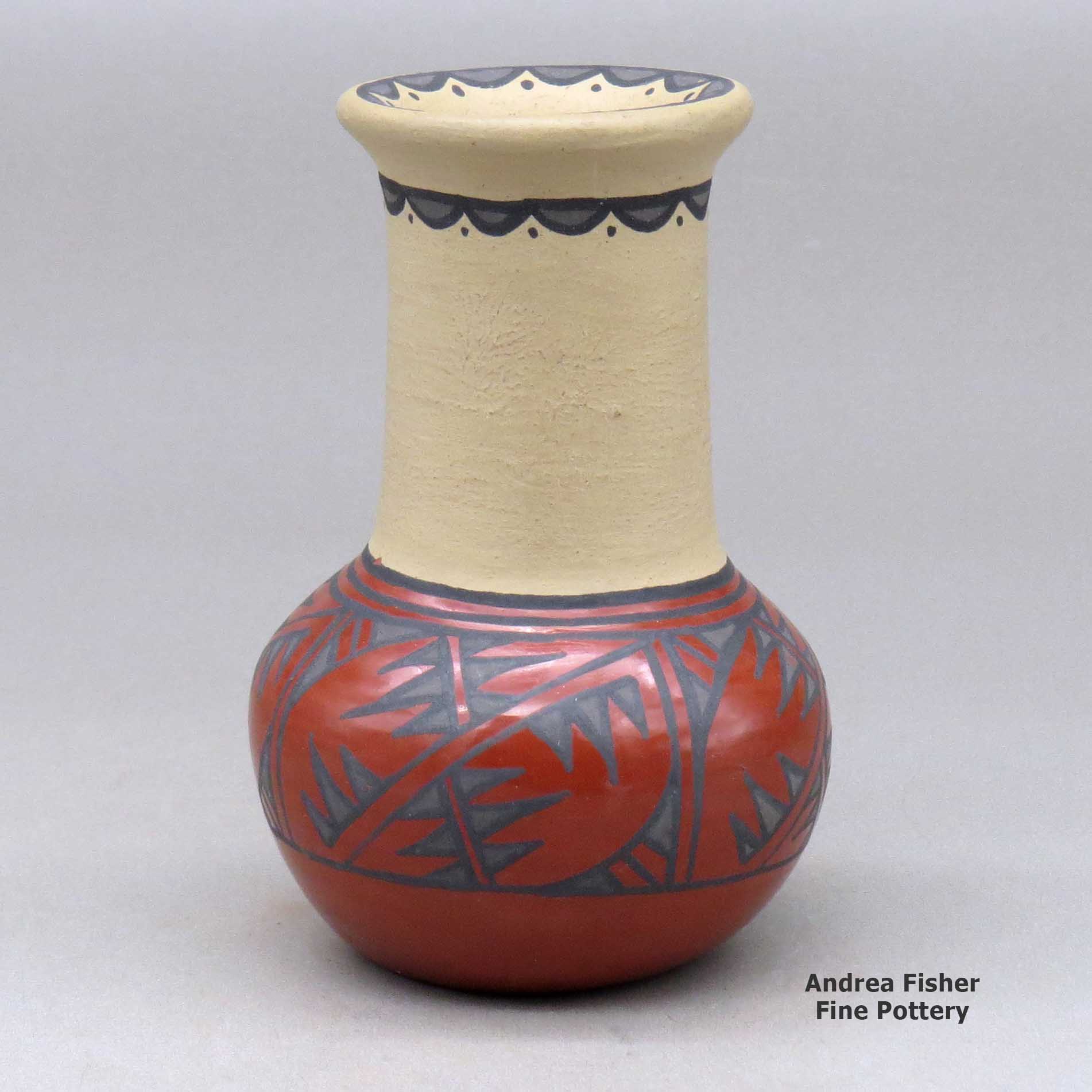 Click or tap to see a larger view A small polychrome vase decorated with a geometric design around the shoulder, upper neck and inner rim made by Minnie Vigil of Santa Clara