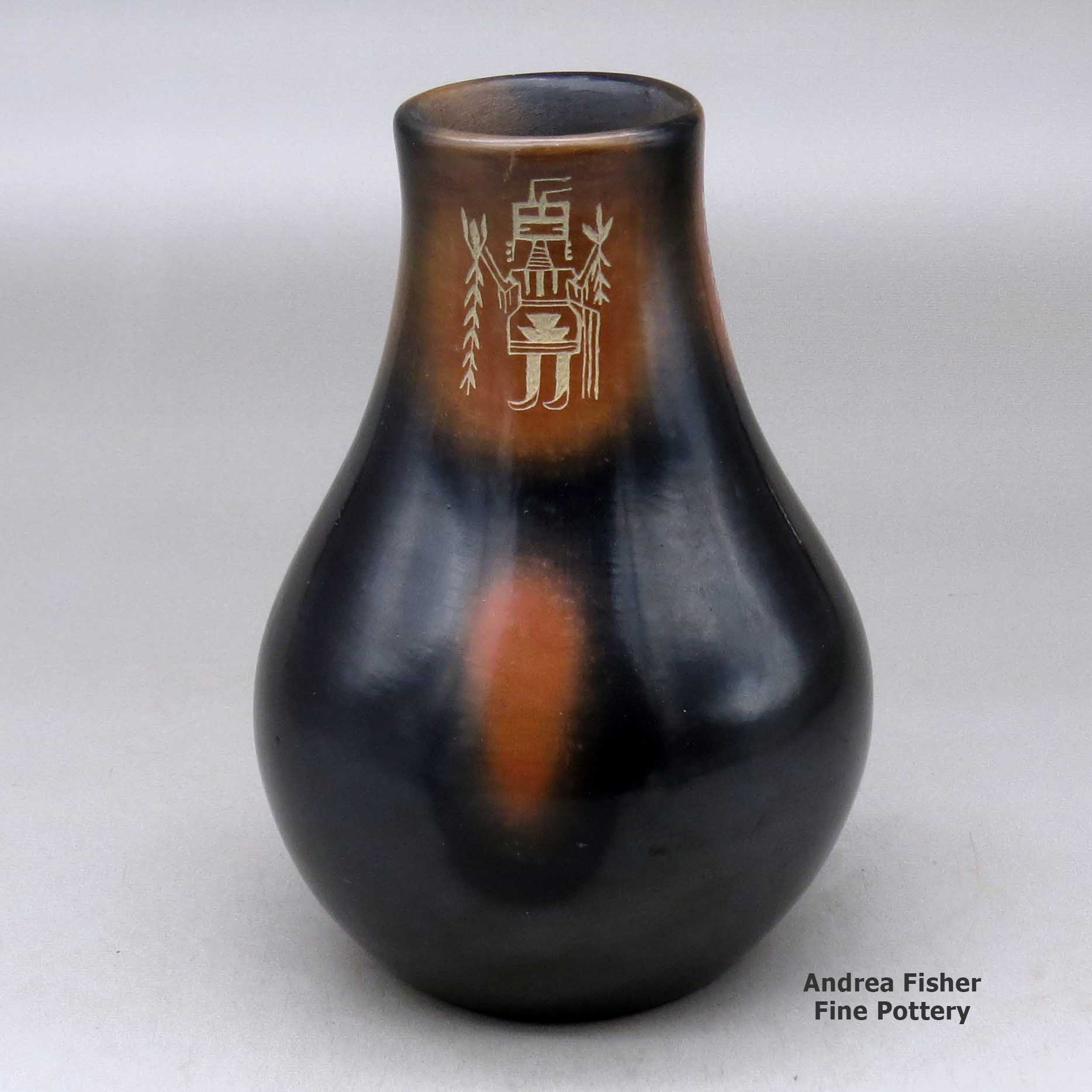 Click or tap to see a larger view A black vase with sienna spots and a three panel sgraffito yeibichai and geometric design made by Grace Medicine Flower of Santa Clara