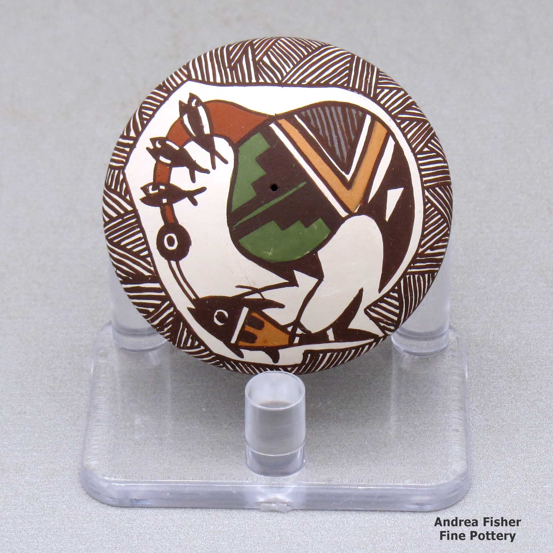 Click or tap to see a larger view A miniature polychrome seed pot decorated with a cloudeater, fish, fineline and geometric design above the shoulder made by Diane Lewis of Acoma