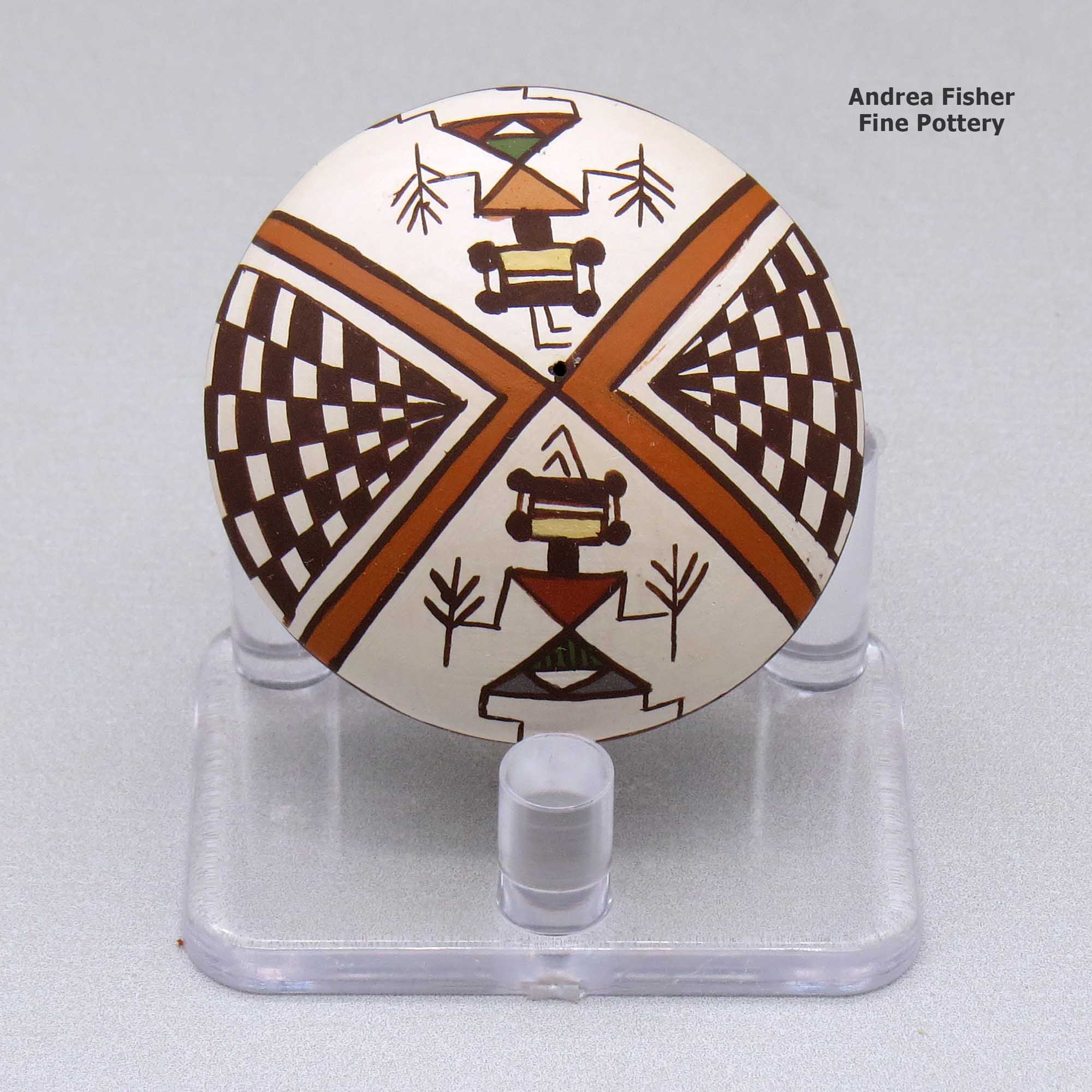Click or tap to see a larger view A miniature polychrome seed pot decorated with a pueblo dancer, checkerboard and geometric design above the shoulder made by Diane Lewis of Acoma