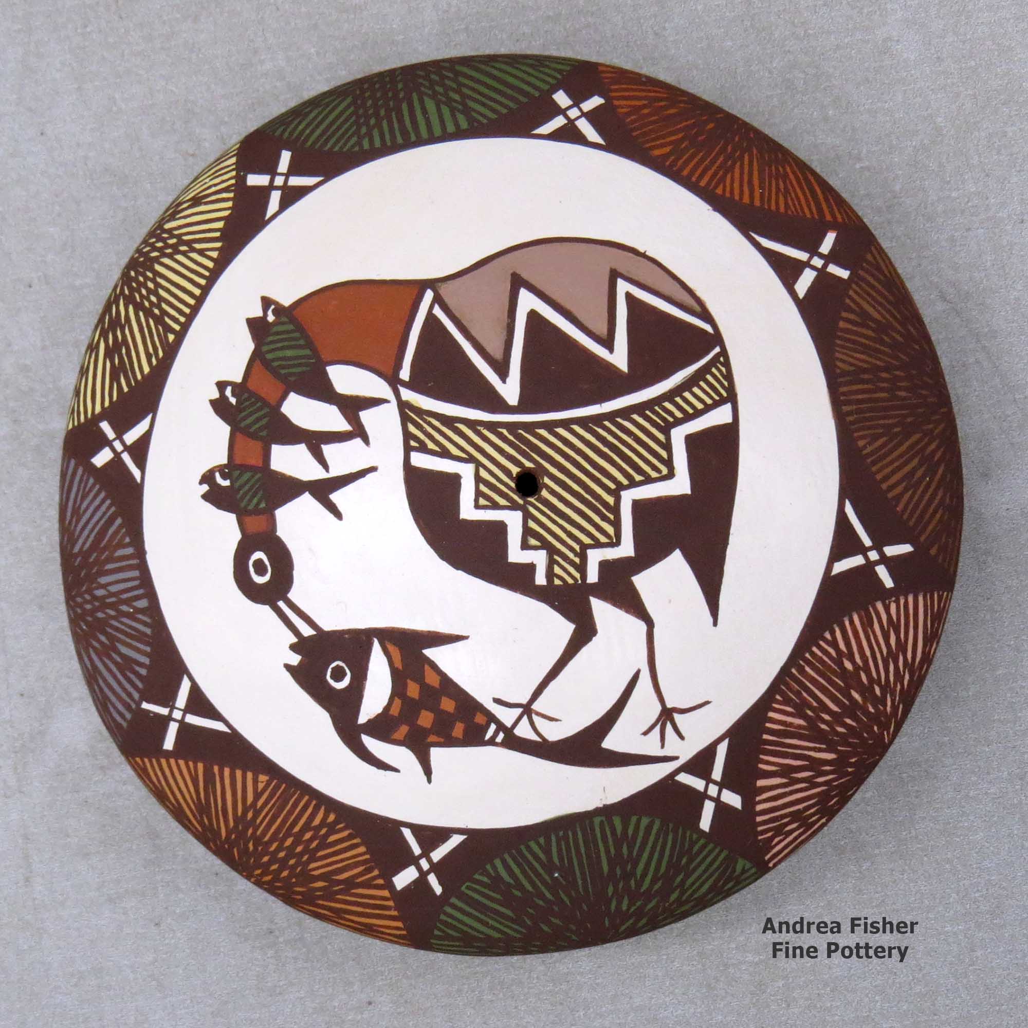 Click or tap to see a larger view A polychrome seed pot decorated above the shoulder with a cloudeater, fish, fineline and geometric design made by Diane Lewis of Acoma