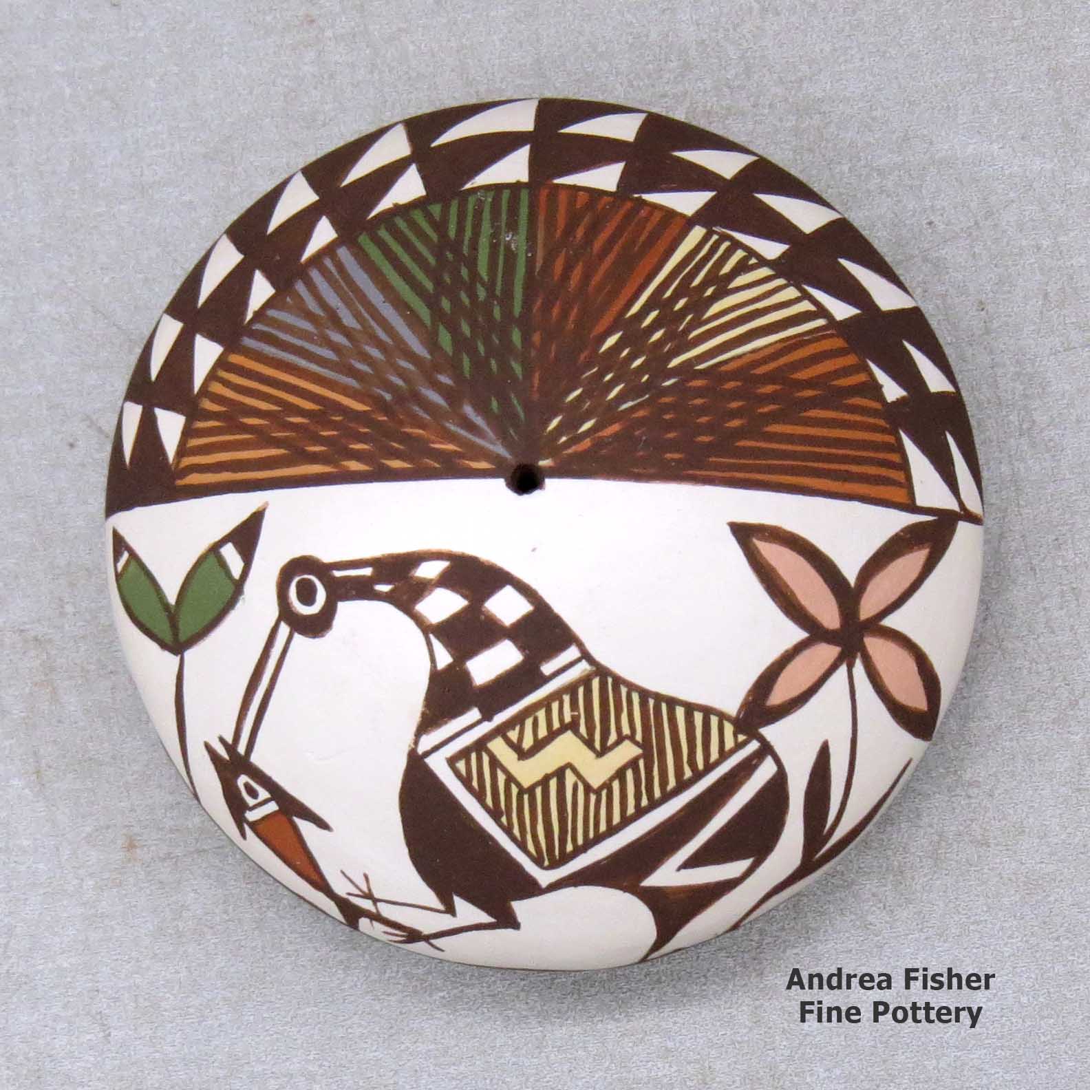 Click or tap to see a larger view A miniature polychrome seed pot decorated with a cloudeater, fish, plant, fineline and geometric design above the shoulder made by Diane Lewis of Acoma