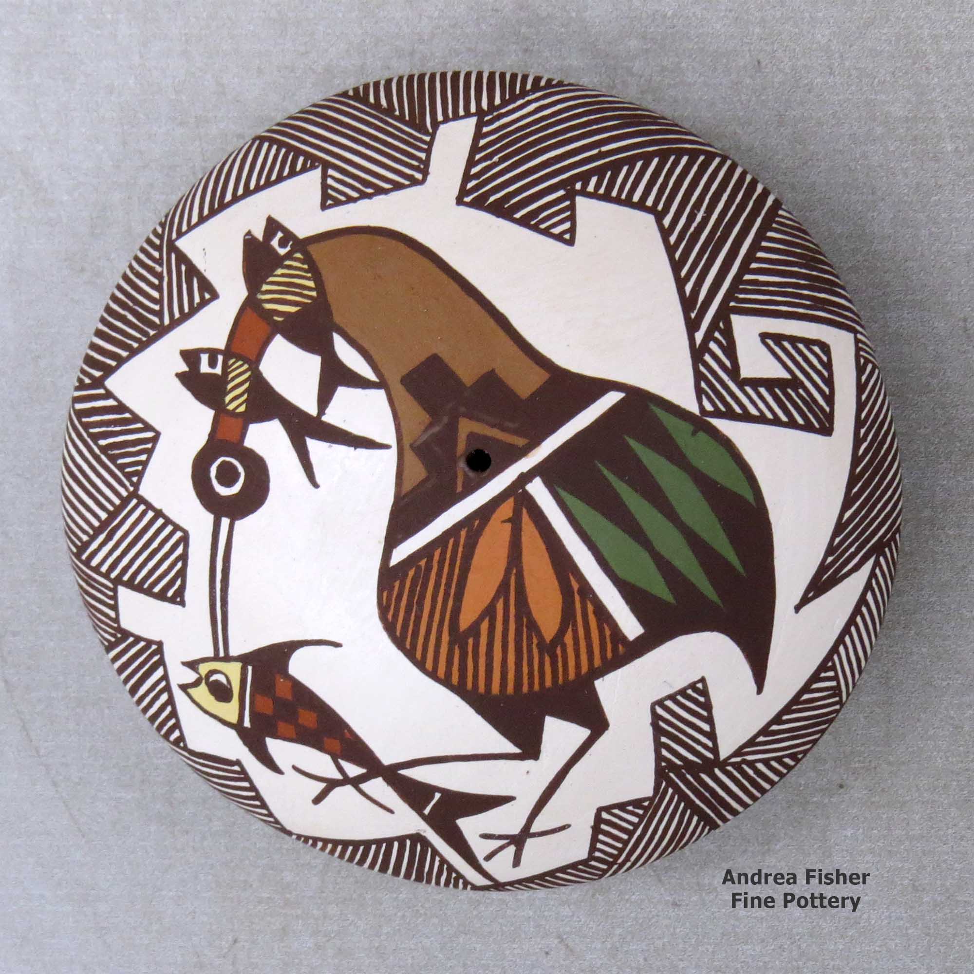 Click or tap to see a larger view A polychrome seed pot decorated with a cloudeater, fish, fineline and geometric design above the shoulder made by Diane Lewis of Acoma