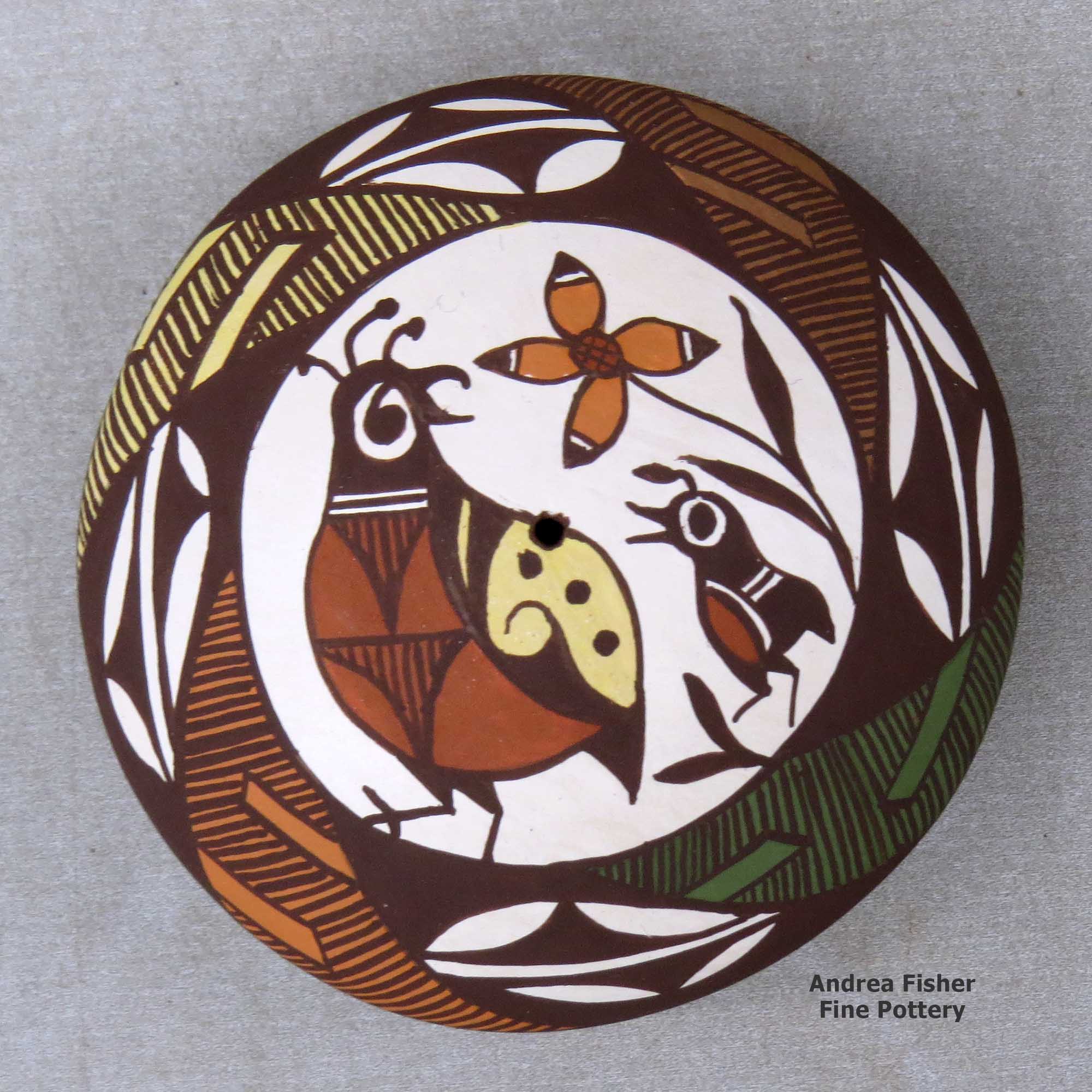 Click or tap to see a larger view A polychrome seed pot decorated with a quail, fineline, plant and geometric design above the shoulder made by Diane Lewis of Acoma