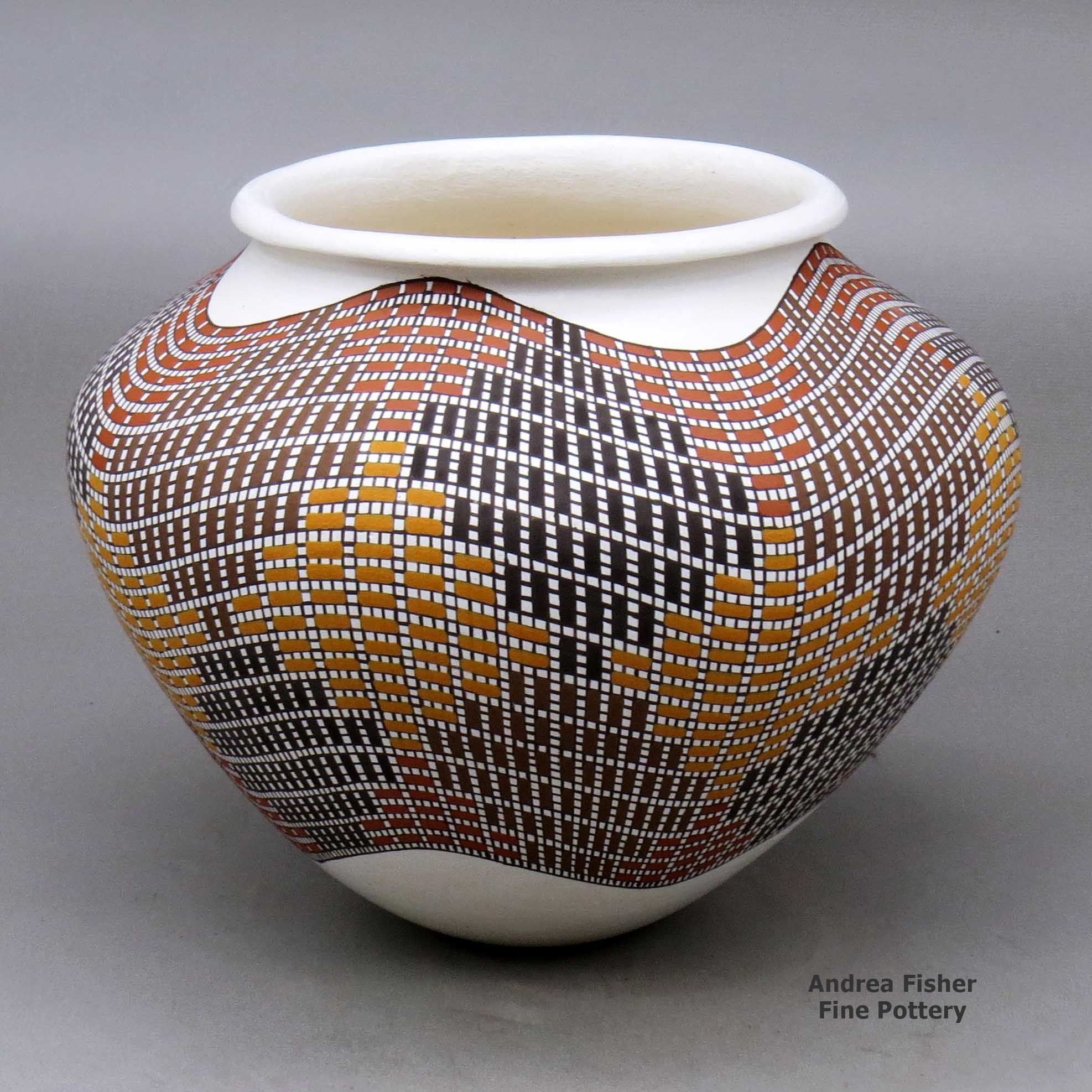 Click or tap to see a larger view A polychrome jar with a a rolled lip and decorated with a tiny squares geometric design made by Frederica Antonio of Acoma