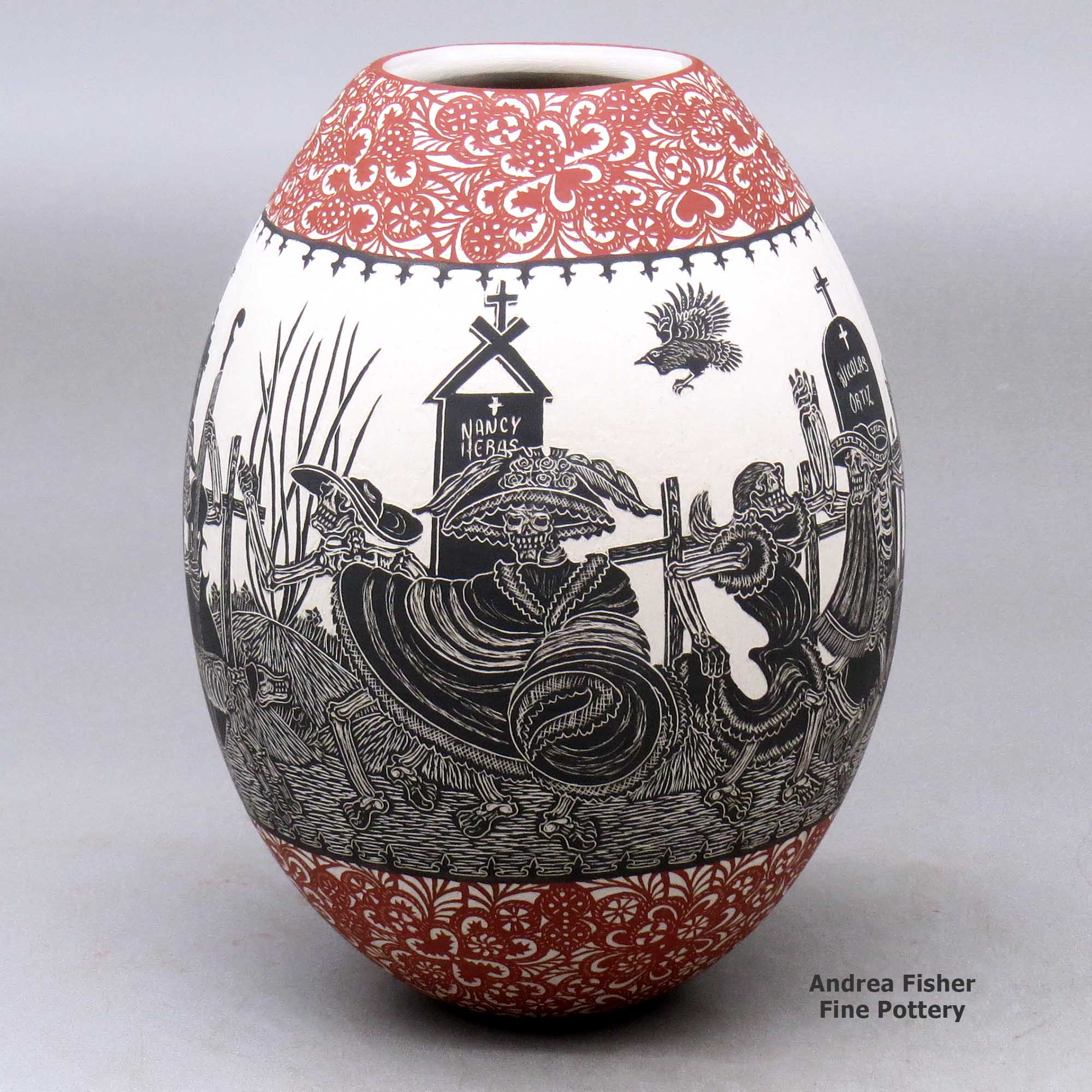 Click or tap to see a larger view A polychrome jar decorated with a sgraffito Day of the Dead at the Cemetery and geometric design made by Hector Javier Martinez of Mata Ortiz and Casas Grandes