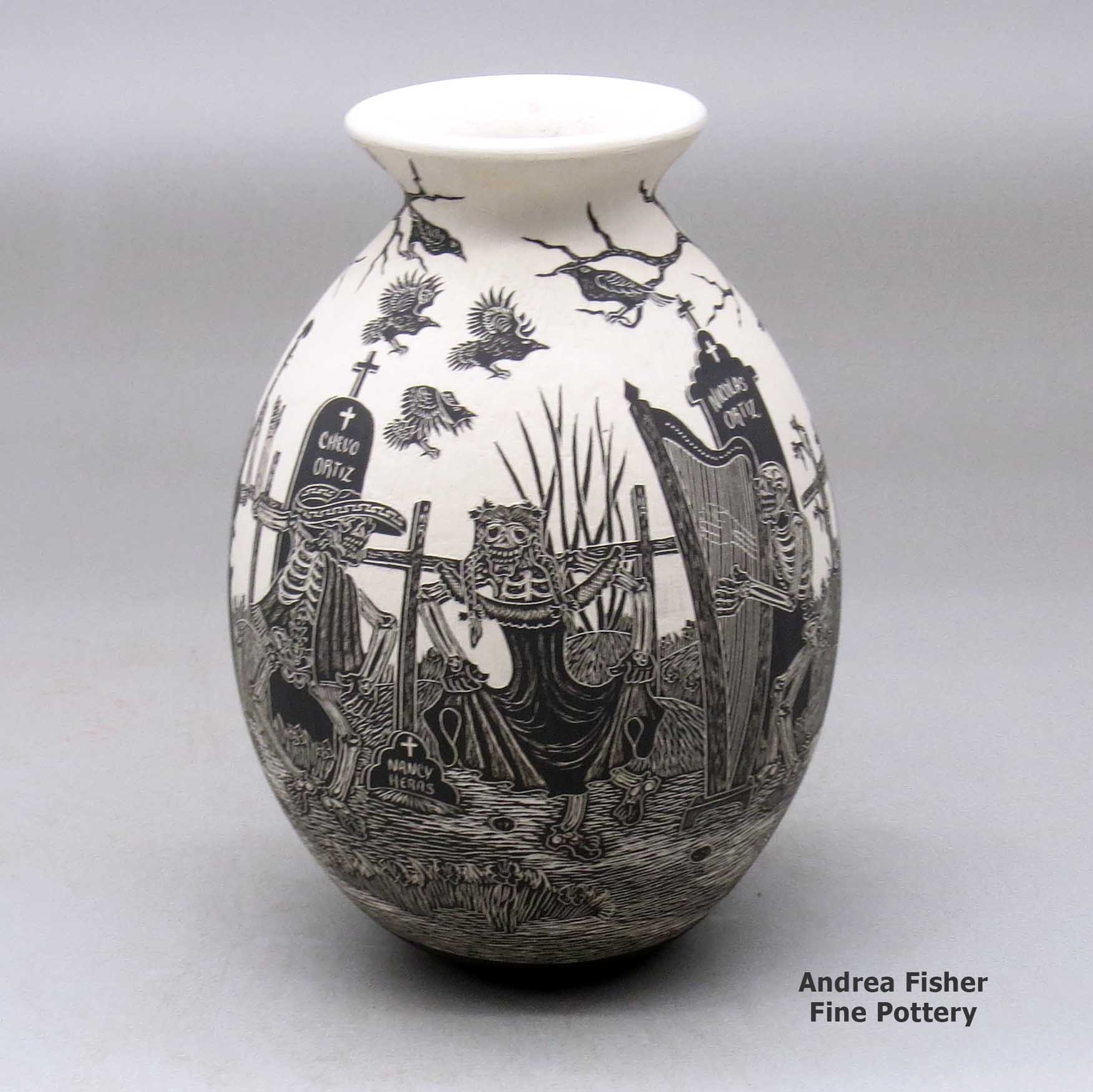 Click or tap to see a larger view A black on white jar with a flared rim and decorated with a sgraffito Day of the Dead at the cemetery design made by Hector Javier Martinez of Mata Ortiz and Casas Grandes