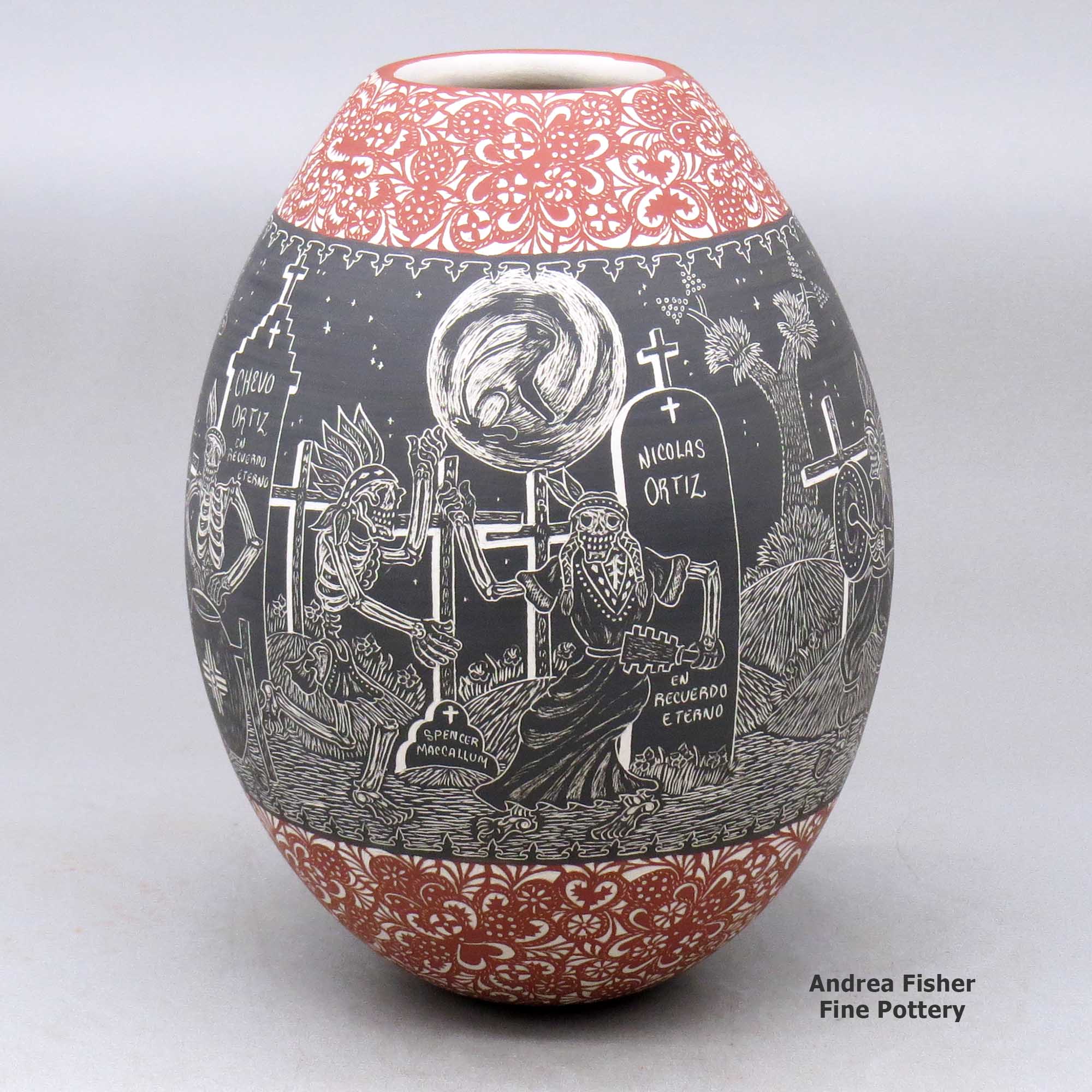 Click or tap to see a larger view A polychrome jar decorated with a sgraffito Night of the Dead at the Cemetery with Native Americans, and geometric design made by Hector Javier Martinez of Mata Ortiz and Casas Grandes