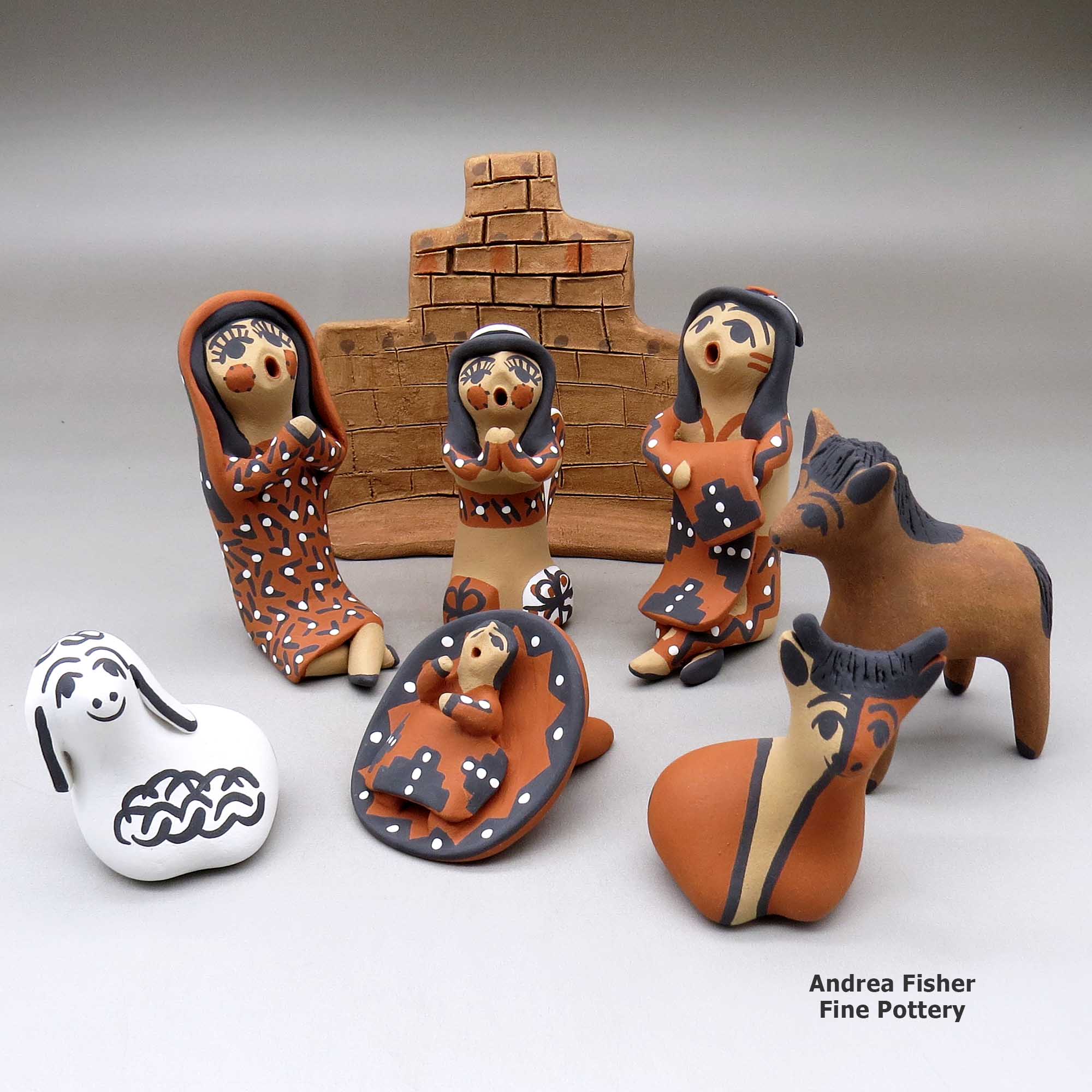 Click or tap to see a larger view An eight piece Jemez style nativity set made by Felicia Fragua of Jemez