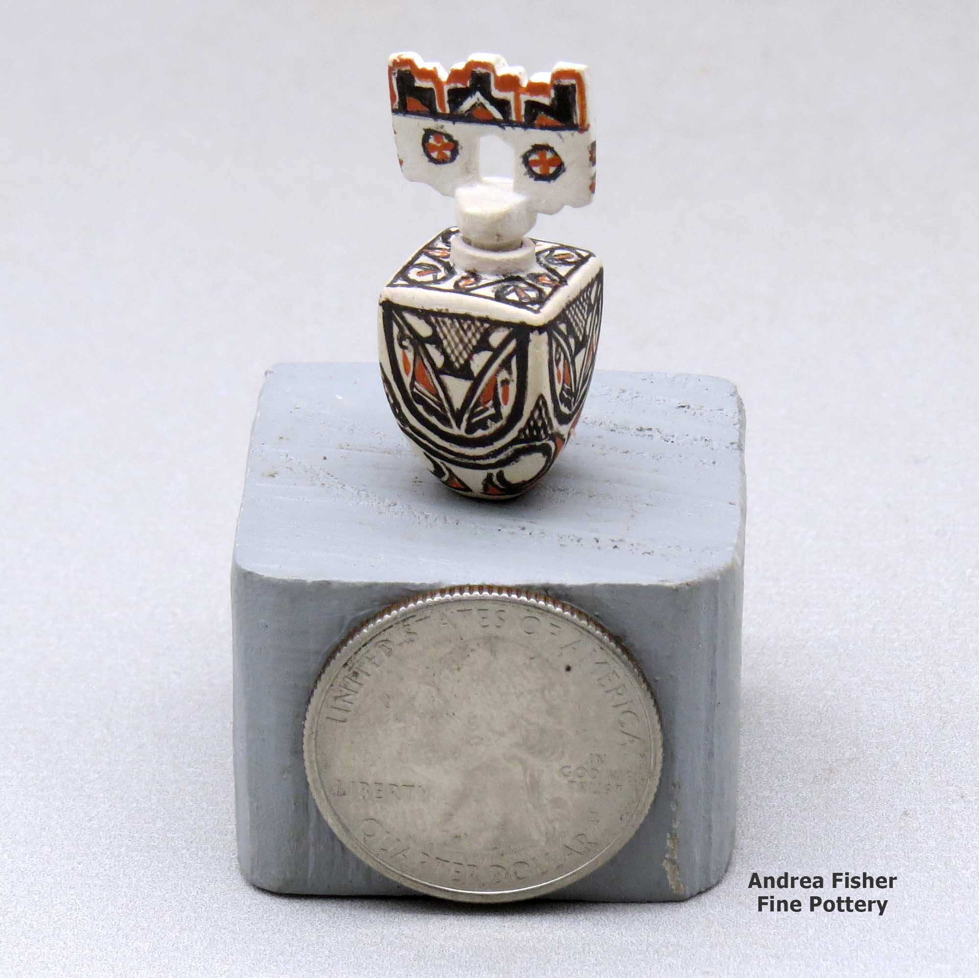 Click or tap to see a larger view A miniature polychrome square jar decorated with a geometric design and a tablito lid made by Thomas Natseway of Laguna