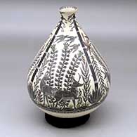 A polychrome low shouldered, tiny neck jar decorated with a four panel wildlife and nature design, with fish around the bottom
 by Hector Gallegos Jr of Mata Ortiz and Casas Grandes
