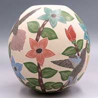 Polychrome jar with a sgraffito and painted hummingbird, butterfly, flower, leaf and branch design, click or tap to see a larger version