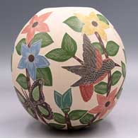 Polychrome jar with a sgraffito and painted hummingbird, butterfly, flower, leaf and branch design, click or tap to see a larger version