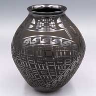 Black-on-black jar with a flared rim and a cuadrillos and geometric design
 by Ismael Sandoval of Mata Ortiz and Casas Grandes