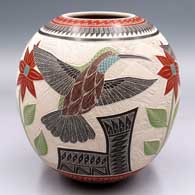 Polychrome jar with a lightly-carved, sgraffito and painted 3-panel hummingbird, flower and geometric design
 by Jesus Olivas of Mata Ortiz and Casas Grandes