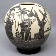 A black and white jar with sgraffito Day of the Dead motif
 by Emiliano Rodriguez of Mata Ortiz and Casas Grandes