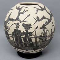 A black and white jar with sgraffito Day of the Dead motif
 by Emiliano Rodriguez of Mata Ortiz and Casas Grandes