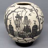 A black and white jar with sgraffito Day of the Dead design
 by Alfredo Rodriguez of Mata Ortiz and Casas Grandes