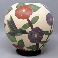 Polychrome jar with sgraffito and painted bird, branch and flower design, click or tap to see a larger version