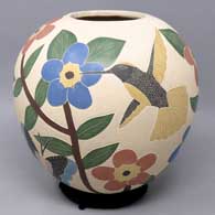 Polychrome jar with sgraffito and painted bird, branch and flower design
 by Karla Flores of Mata Ortiz and Casas Grandes