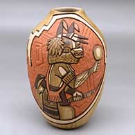 A polychrome jar decorated with a two panel carved and painted masked Hopi dancers and geometric design
 by Elvira Nampeyo of Hopi