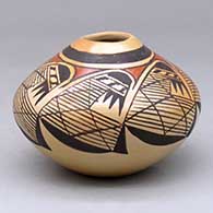 A polychrome seed pot decorated around the body with a migration pattern and geometric design
 by Miriam Nampeyo of Hopi