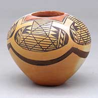 A polychrome seed pot decorated around and above the shoulder with a migration pattern and geometric design
 by Miriam Nampeyo of Hopi