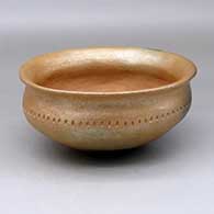 Click for a larger view A golden micaceous bowl with a rolled lip, fire clouds and a single band of corrugation around the shoulder
by Anthony Durand of Picuris
