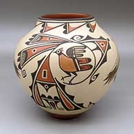 A polychrome jar decorated with a four panel eagle dancer, roadrunner and geometric design
 by Marcellus Medina of Zia