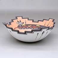 A polychrome prayer bowl decorated with a kolowisi, tadpole, frog and geometric design
 by Marcus Homer of Zuni