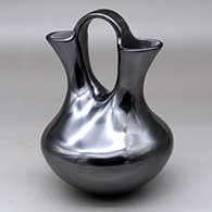 A plain polished graphite wedding vase
 by Martin Olivas of Mata Ortiz and Casas Grandes