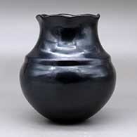 A plain polished black double shouldered water jar with a pie crust rim, click or tap to see a larger version