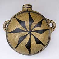 A polychrome canteen with handles and decorated on top with a geometric design
 by Unknown of Cochiti