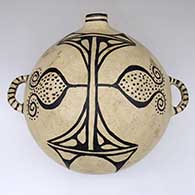 A polychrome canteen with handles and decorated with a black-on-white flower and geometric design
 by Unknown of Cochiti