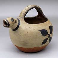 A polychrome pitcher with a serpent head spout and painted around the body with a geometric design
 by Unknown of Cochiti