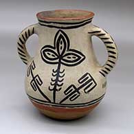 A polychrome jar with handles and decorated with a black-on-white plant and geometric design
 by Unknown of Cochiti