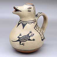 A polychrome pitcher with a bird head spout and decorated with a bird element, lizard and geometric design
 by Unknown of Cochiti