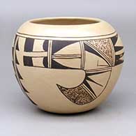 A black-on-tan bowl decorated with a two-panel bird-hanging-from-sky-band and geometric design
 by Unknown of Hopi