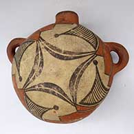 A polychrome canteen with handles and decorated with a geometric design
 by Unknown of Zia