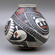 A jar with a flared rim and decorated with a three panel geometric design, click or tap to see a larger version