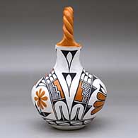A polychrome wedding vase with a twisted bridge and decorated with a two panel parrot, rainbow, flower, plant and geometric design, click or tap to see a larger version