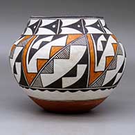 A polychrome jar decorated with a six-panel kiva step, fine line and geometric design, click or tap to see a larger version